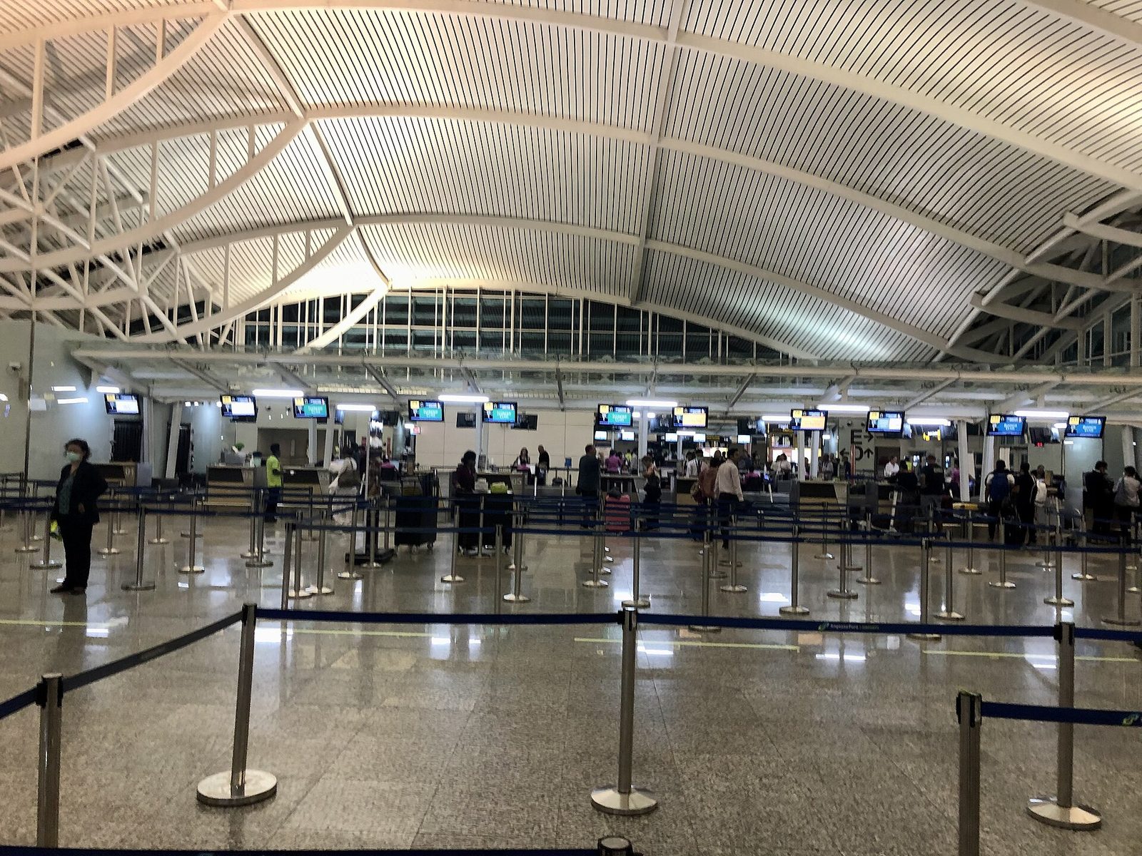 Immigration counters in the international arrival hall at Ngurah Rai Airport