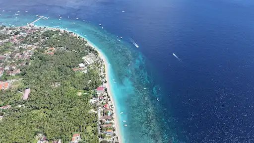 Aerial view of the Prapat coastal strip in Ped, Nusa Penida