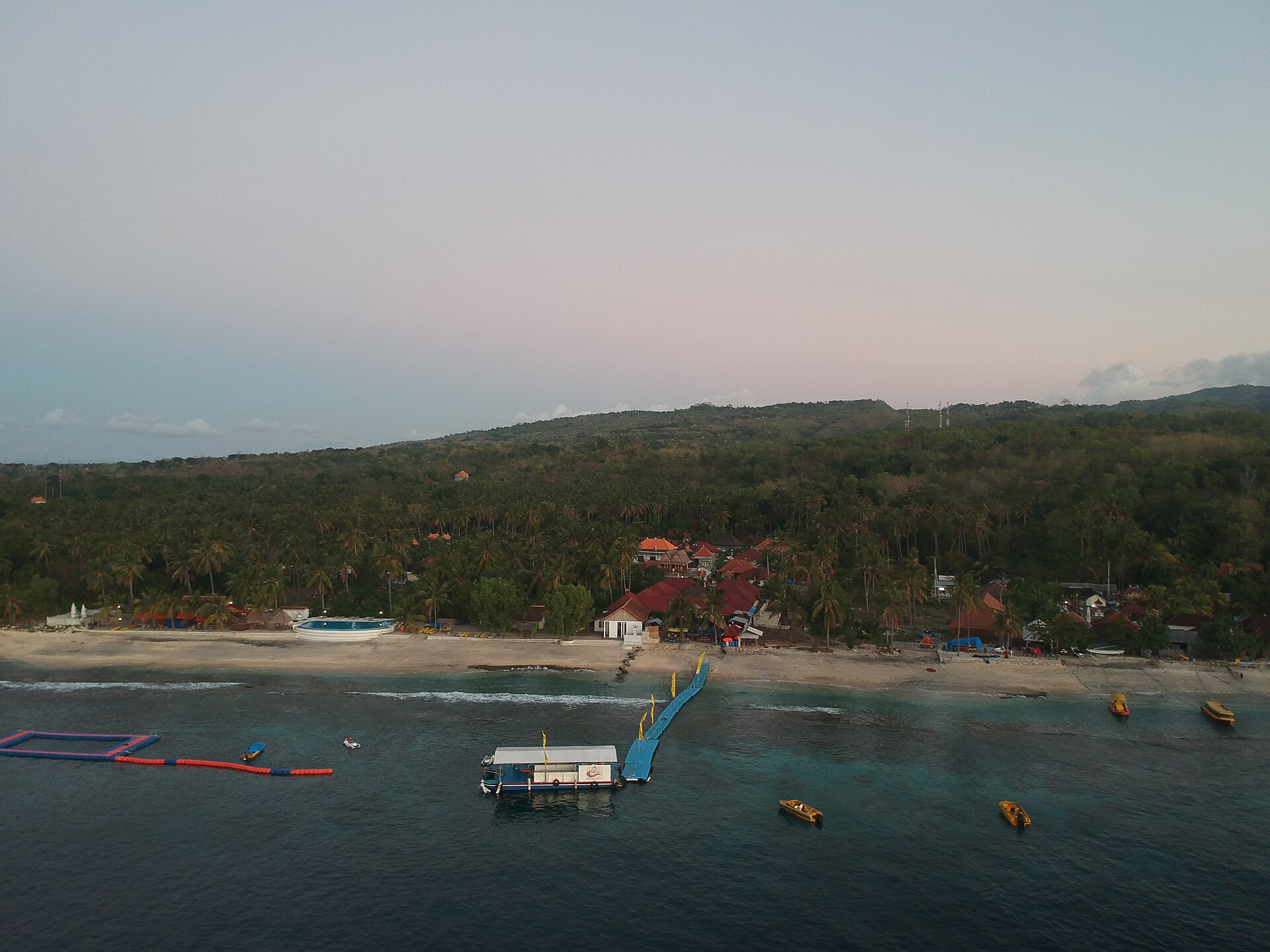 Boats and harbour activity at Buyuk on Nusa Penida
