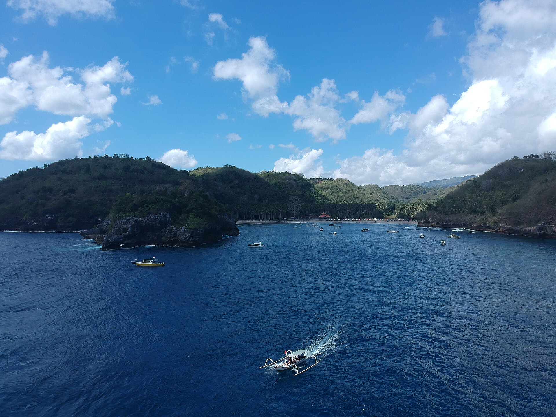 High aerial view of Crystal Bay and the hills behind the beach