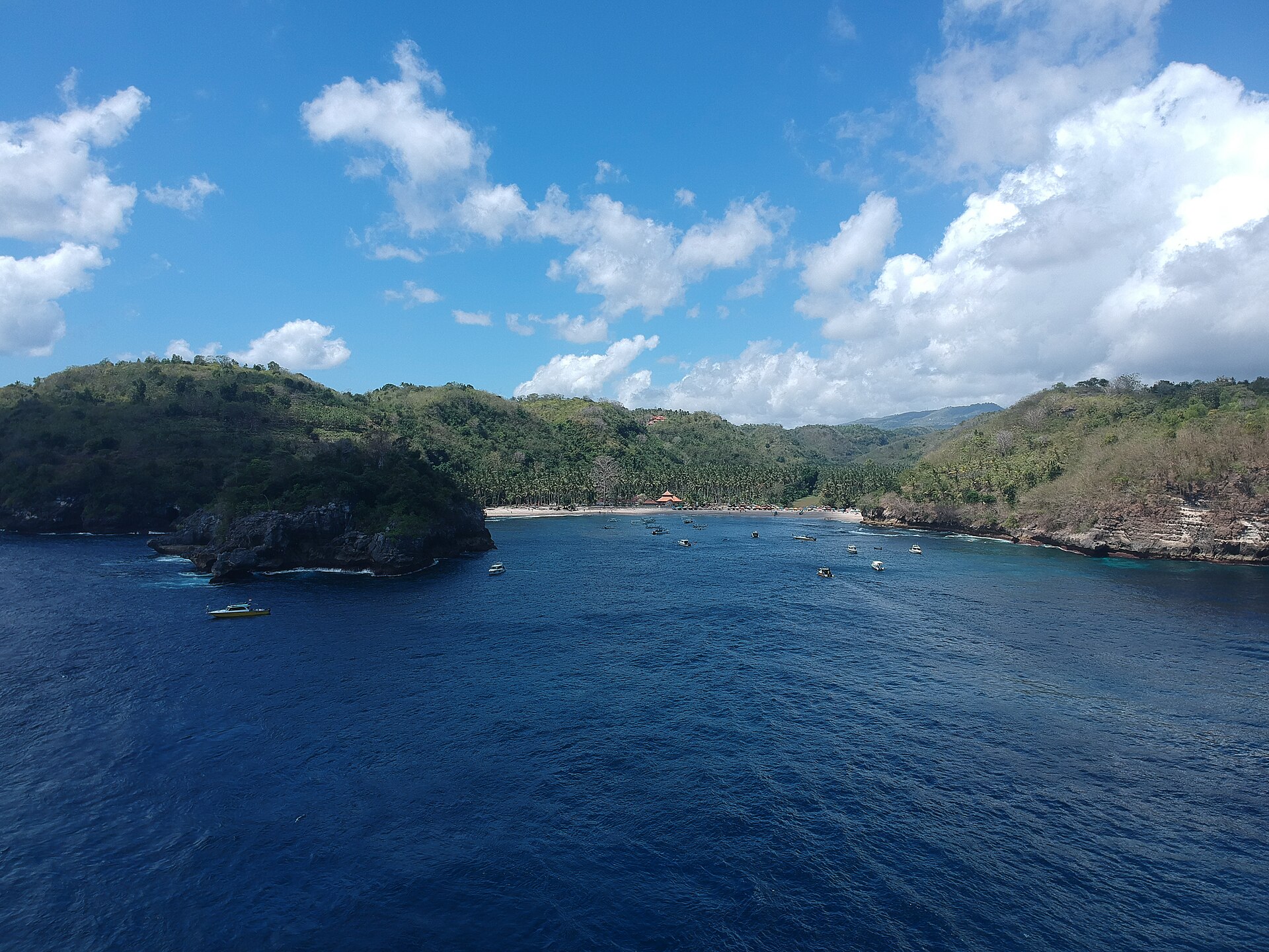 Crystal Bay viewed from above with boats spread across the water
