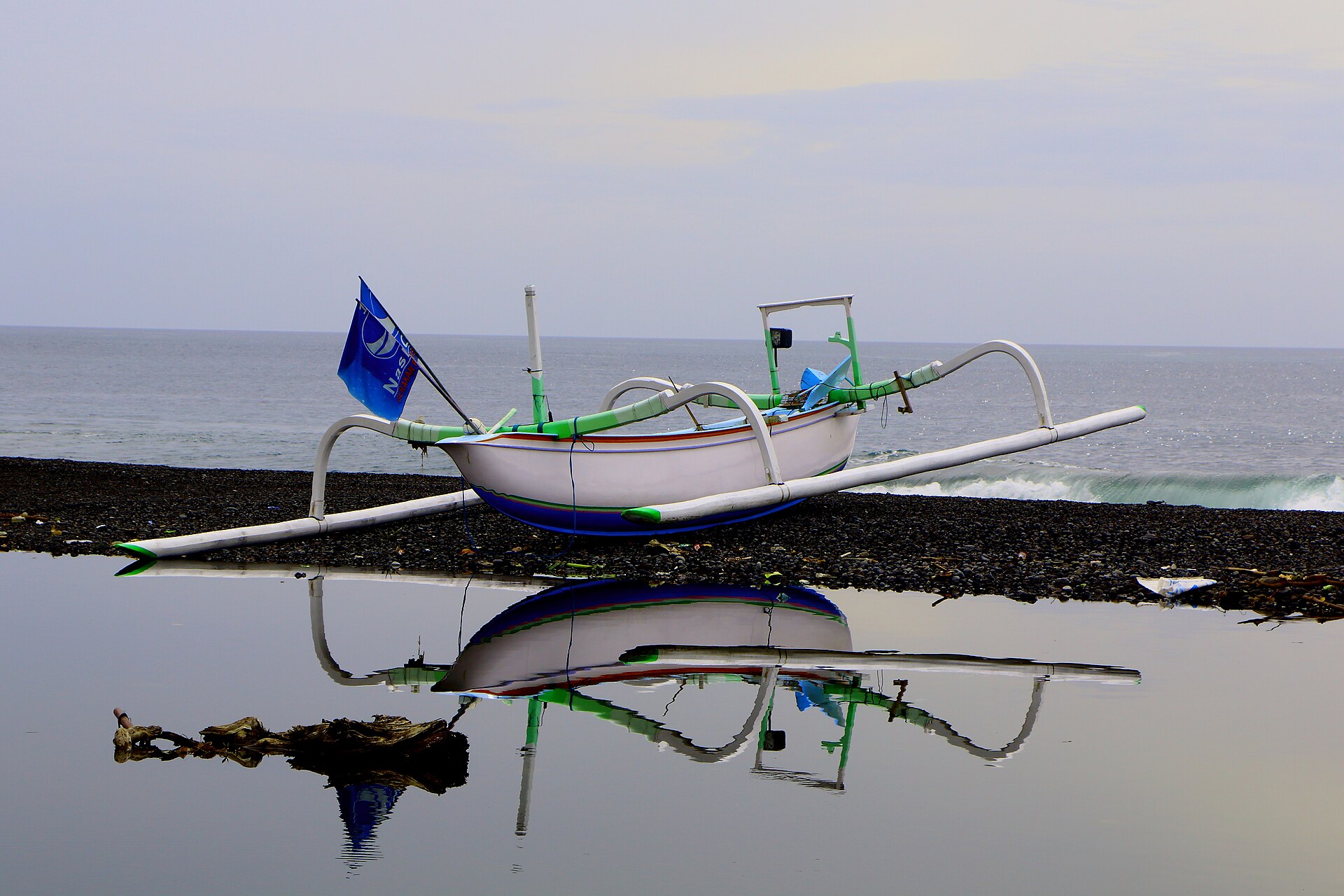 Black-sand coast and traditional activity at Kusamba in east Bali