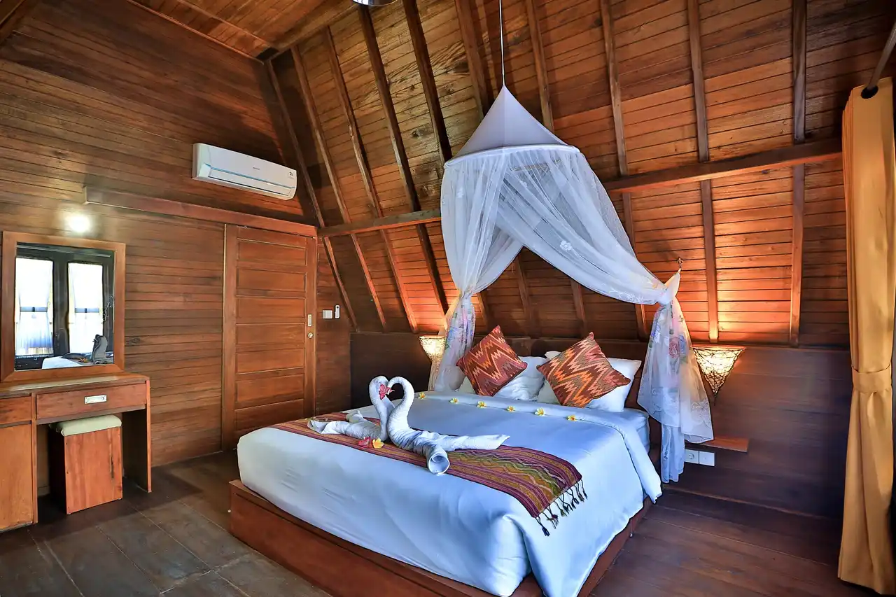 Deluxe queen bungalow interior at Mahaloka Valley Resort