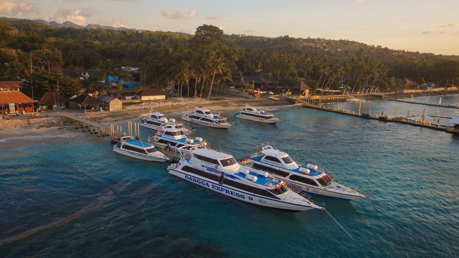 Gangga Express fast boats moored beside a Nusa Penida harbour