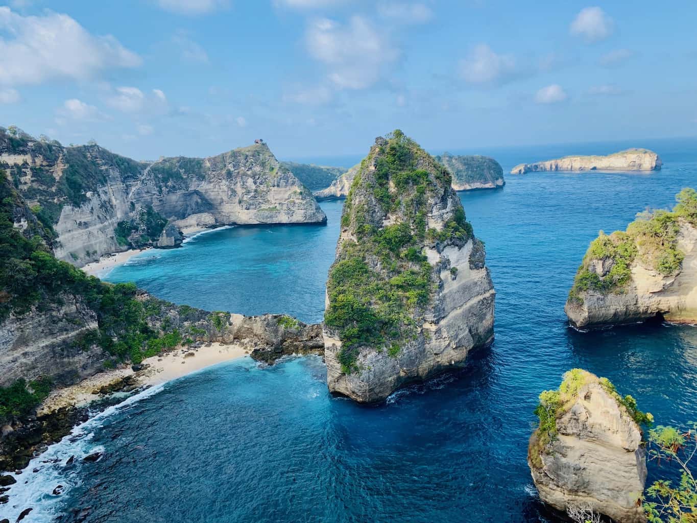 Limestone islets and cliff coastline seen from Thousand Islands Viewpoint in Nusa Penida