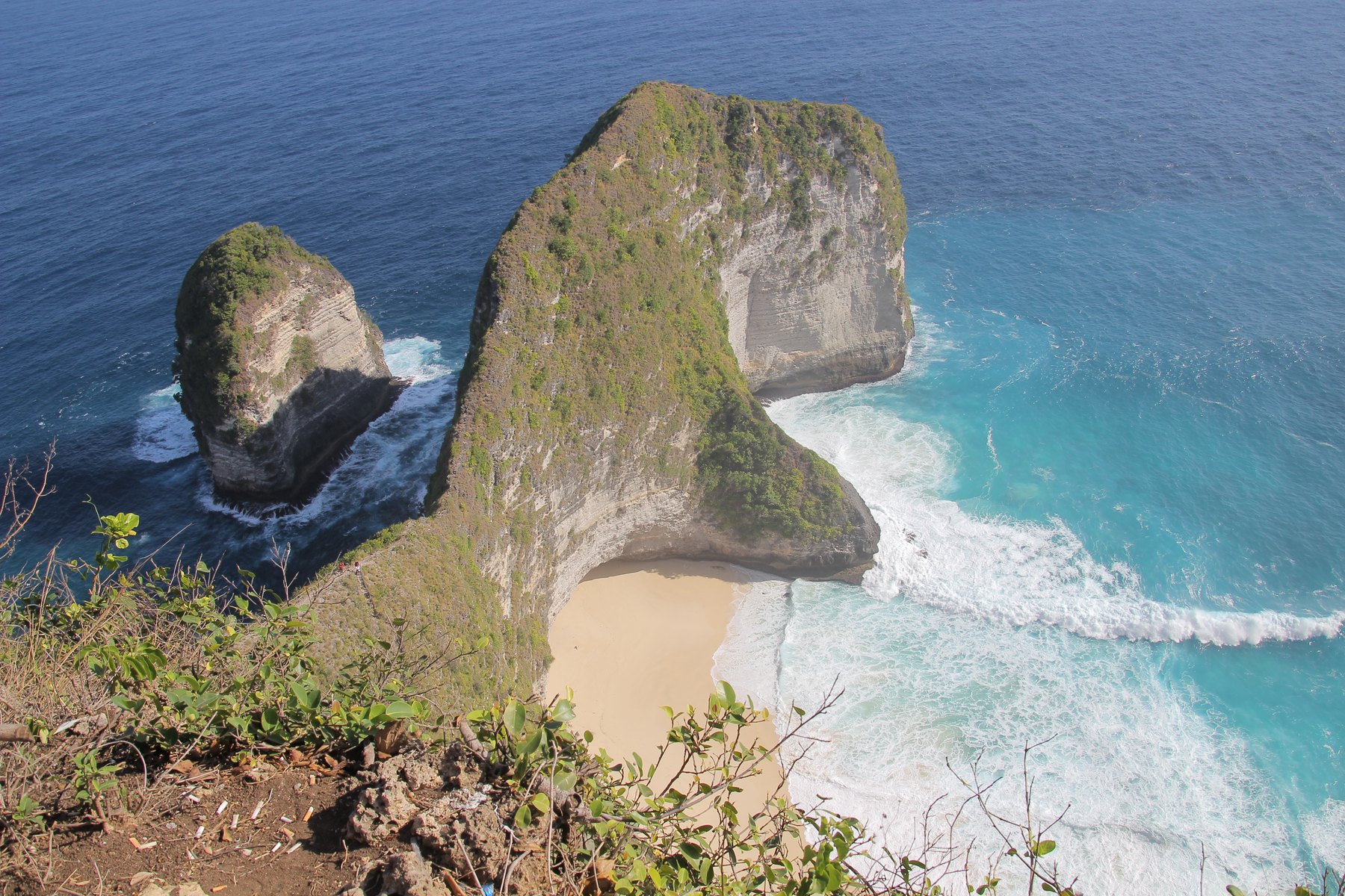 Kelingking headland and beach seen from the cliff above.